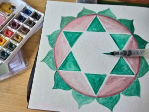 Herz-Shakra-Aquarell in Arbeit
